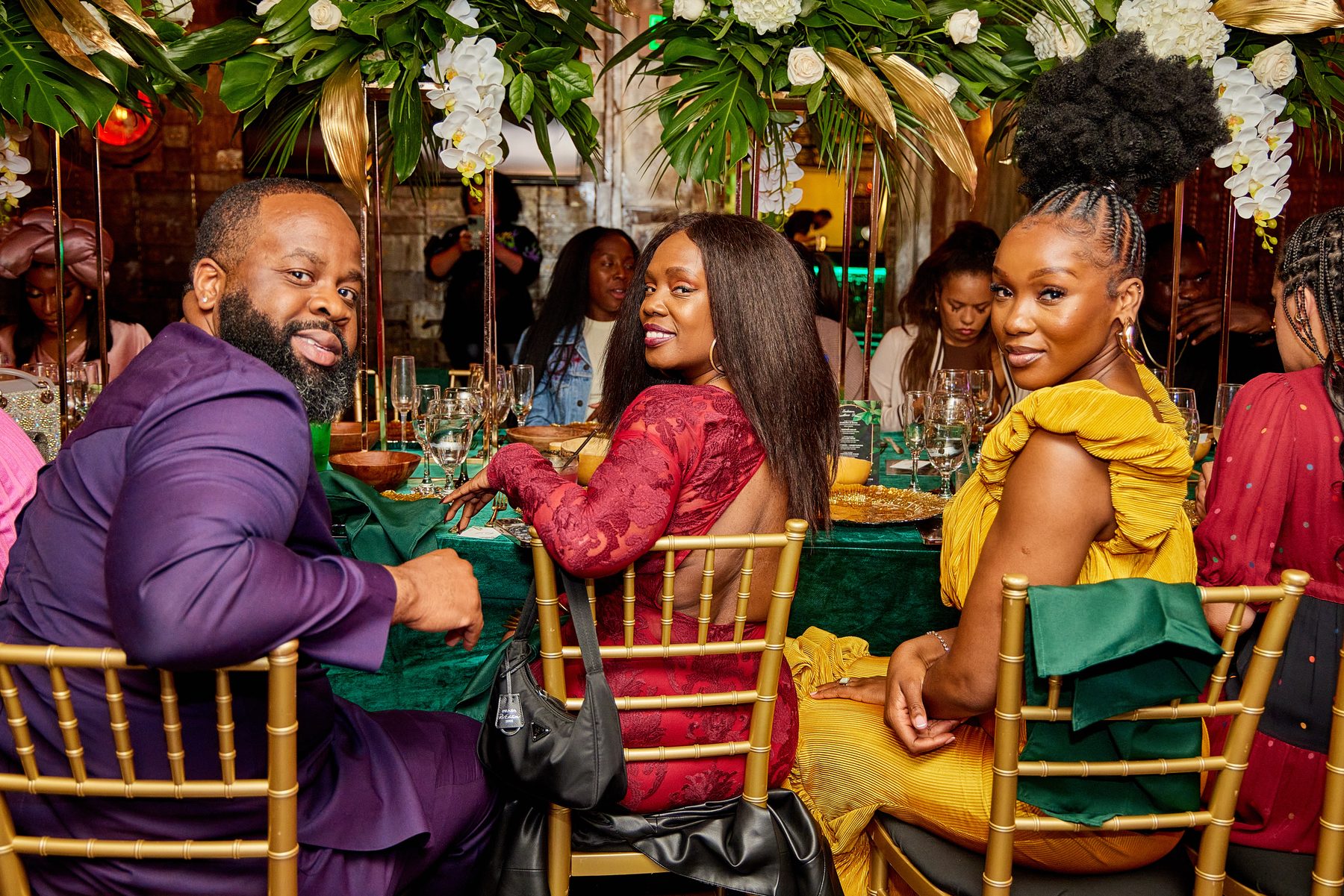 Guests in colourful outfits at an Amplify Africa dinner
